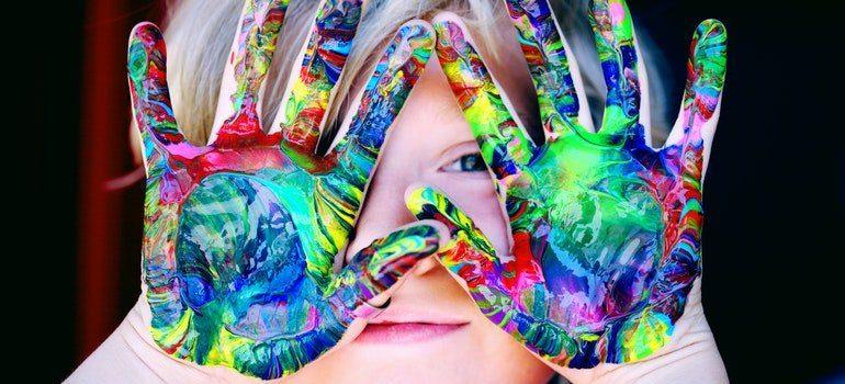 Boy hand painting.