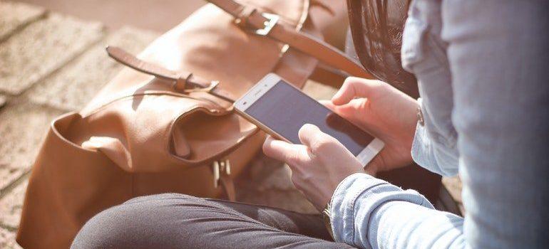 Girl holding a smartphone.