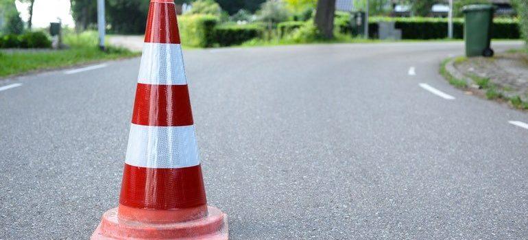 Traffic cone warning you of the mistakes to avoid when moving cross country.