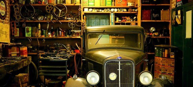 Cluttered garage that might prompt you to organize a yard sale in Tampa.