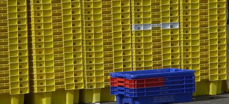 A stack of plastic bins