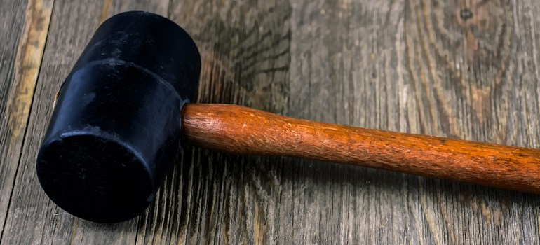 a rubber mallet you will use to dismantle furniture before storing your wooden furniture