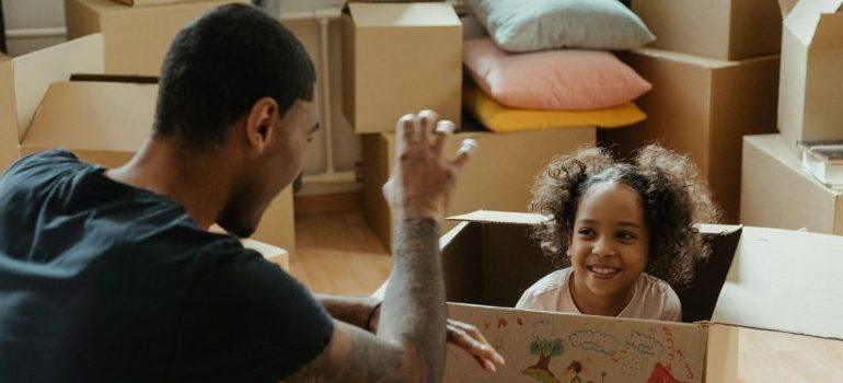 A father and daughter preparing for the move.