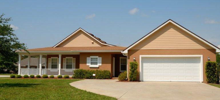 A suburban house with a driveway.