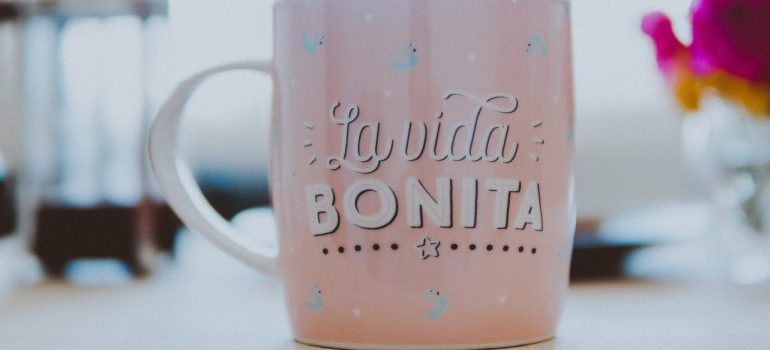 glass with "la vida Bonita" written on it