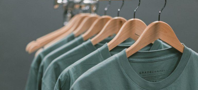 green shirts on hangers