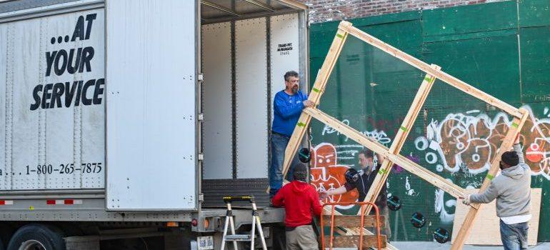 Movers loading up the moving truck