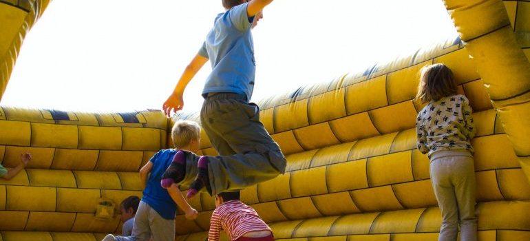 Kids playing in a bouncy castle