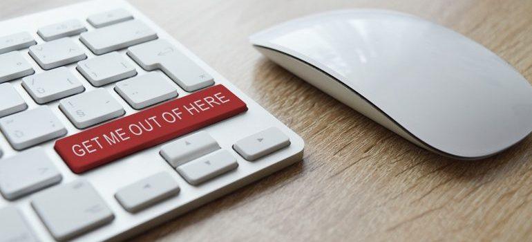 A red get me out of here button on a keyboard.