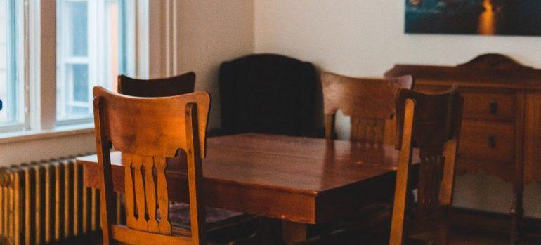 A table and chairs in the old dining room.