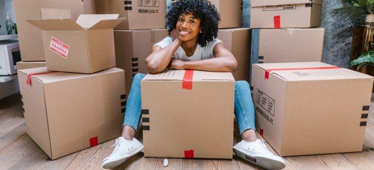 Woman with boxes for the move.