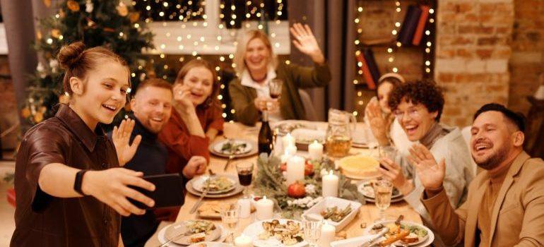 The family is gathering around the table