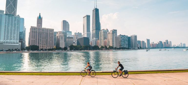Two people riding bikes in Chicago