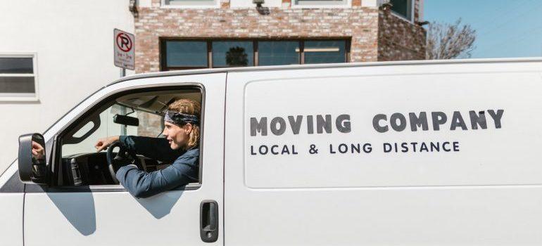 Mover driving a moving van.