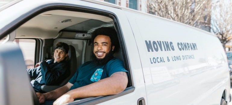 Movers in a moving van.