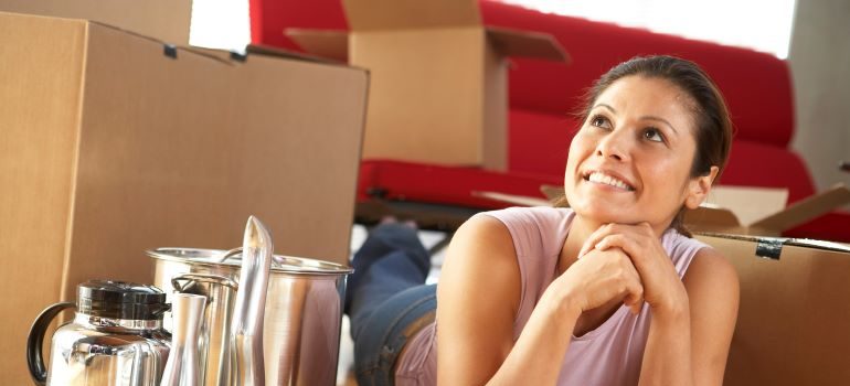woman smiling thinking about her new home