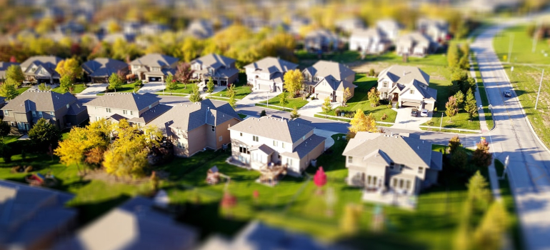 a suburban neighborhood viewed from a birds-eye perspective