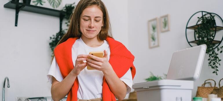 A woman looking at her phone