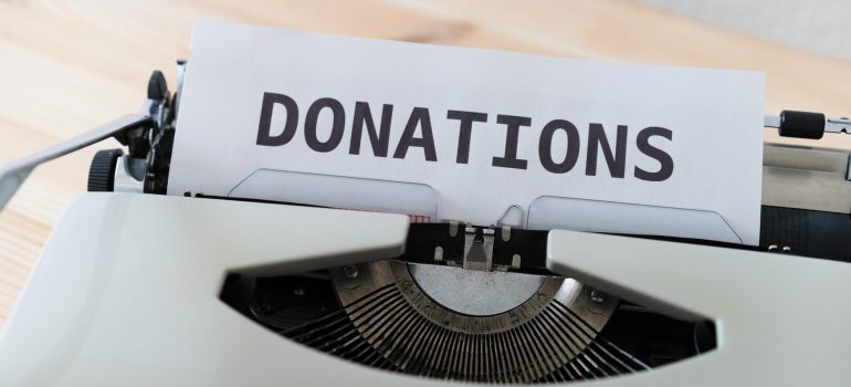 Donations letters on a typing machine