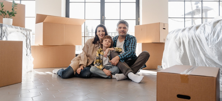 family smiling after reading about Moving from Miami to TX with kids 