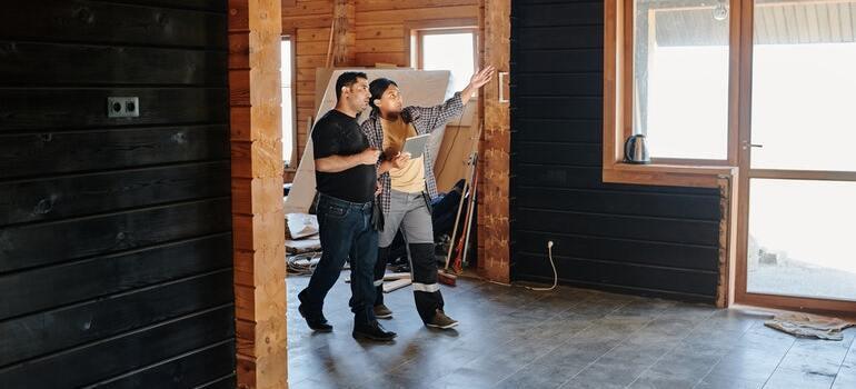 Two man talking about things that need to be done around the house