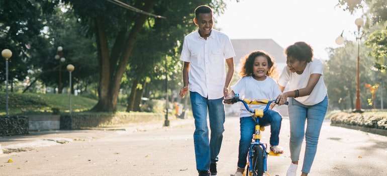 A family of three happy after moving to Columbus after reading the Best places in Texas for families article