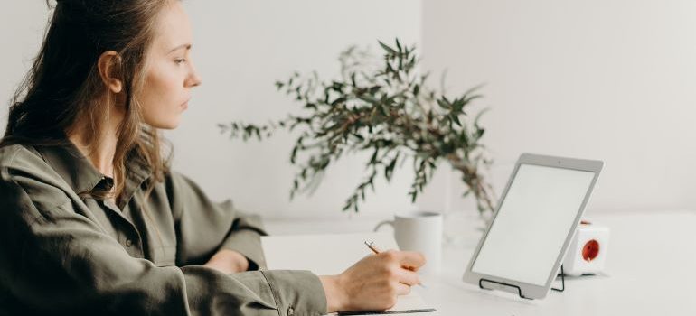 a woman using a laptop