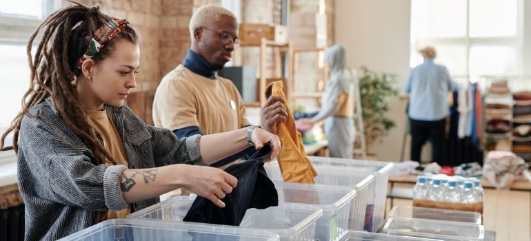 charity workers sorting clothes