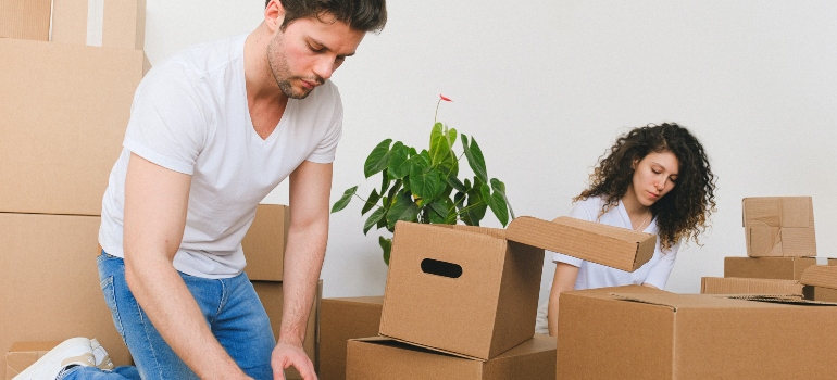 a couple packing is one of the moving services you can save on when moving from Tampa to Austin