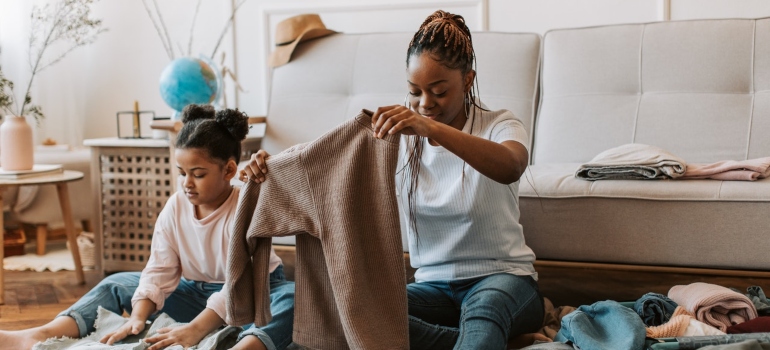 mom and daughter packing