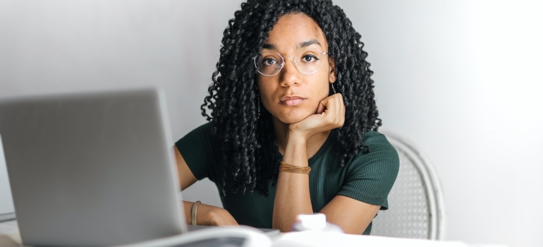 Girl doing research on her laptop 