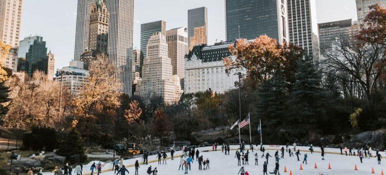 people ice skating in one of the big US cities to move to in 2023