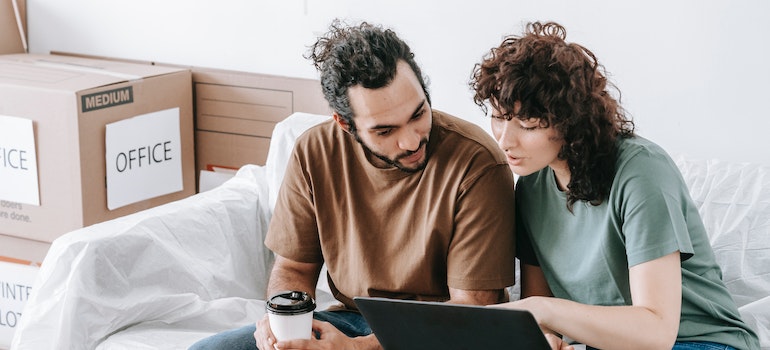 couple looking at a laptop