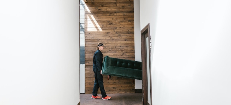 movers carrying a couch