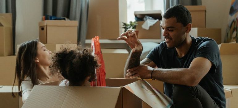 family having fun while packing