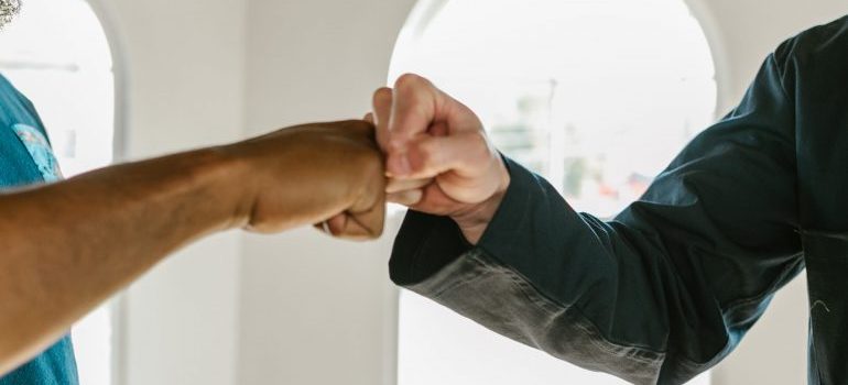 long distance movers Kirby TX has fist bumping 