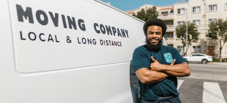 a mover in front of a moving trucks