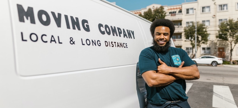 a man standing by the van