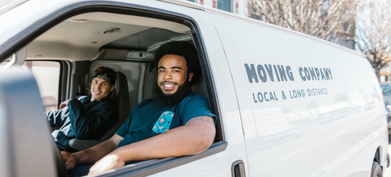 The movers sitting in the van