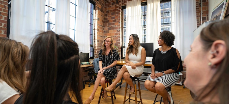 three women talking about the facts you should know before moving to Schulenburg