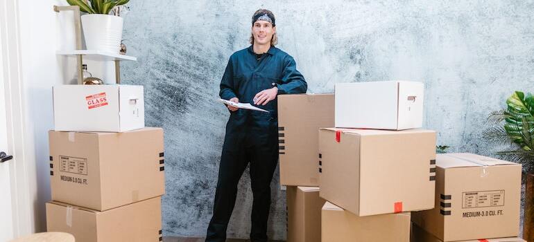 A mover surrounded by moving boxes