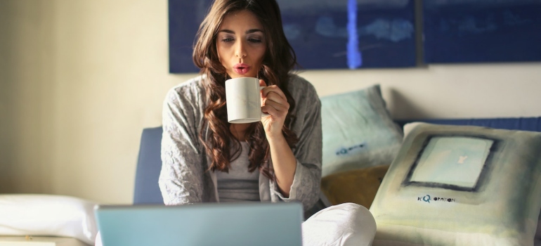 A woman reading a complete New Braunfels moving guide