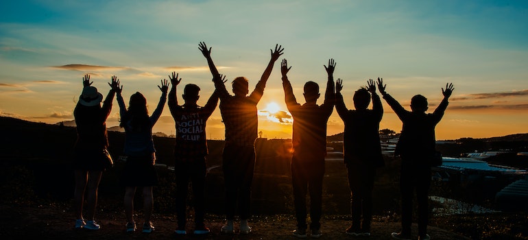 Friends watching the sunset after moving to Dallas TX