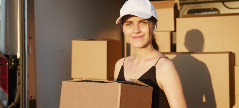 woman holding a box