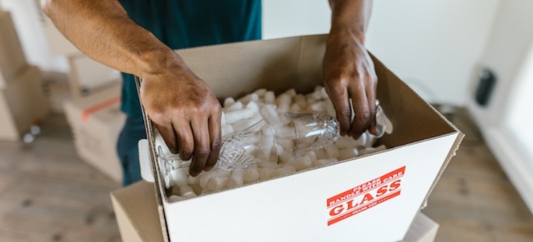 Using some packing tips a mover pack glass in boxes separately