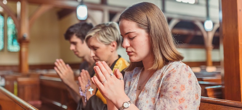 People in the church praying 