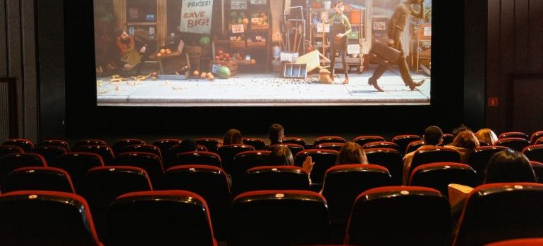 people watching cartoon in cinema
