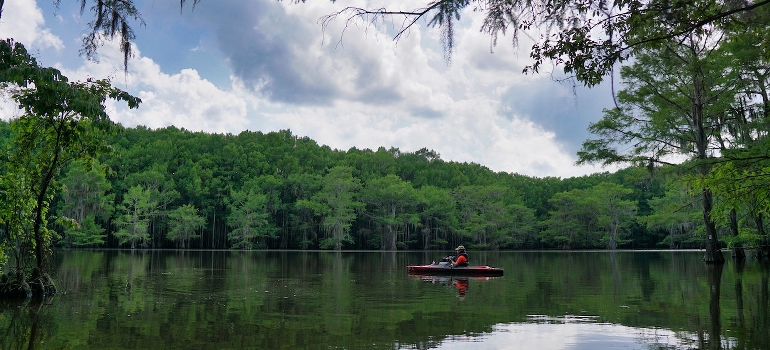 A man on the kayak boat