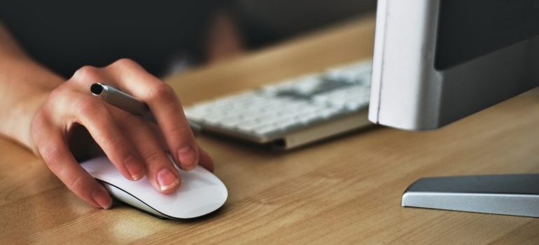 person holding a computer mouse