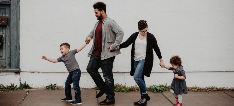 a family walking down the street